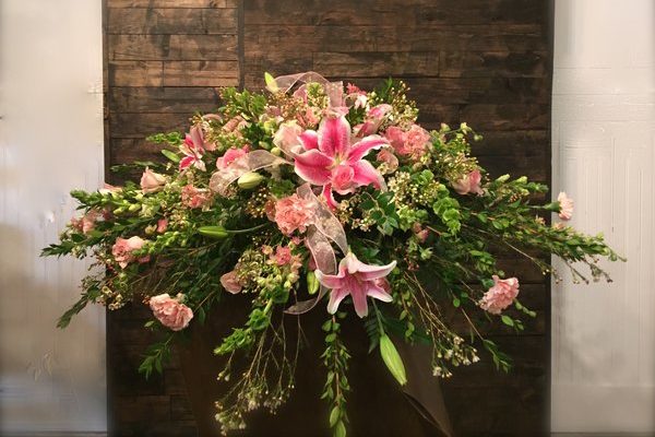 white roses and stargazer lilies Stargazer Lily and Pink Spring Flowers Casket Spray – Wright Flower Company